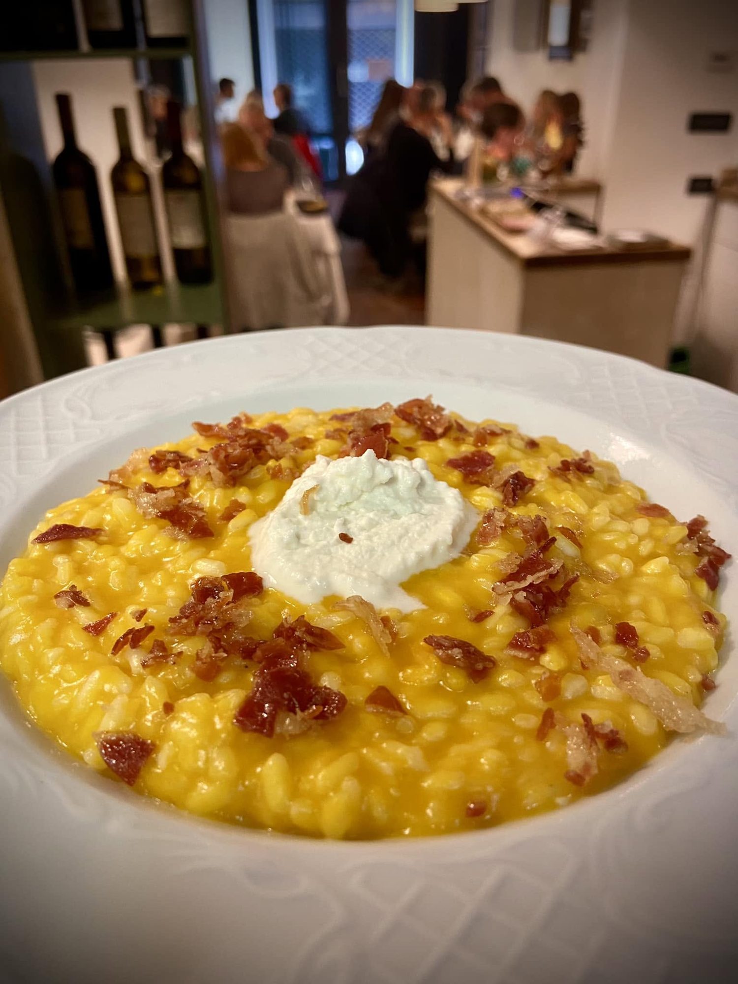 Risotto con zucca, burrata e pancetta